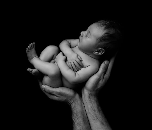 floating newborn at photography session in Leeds