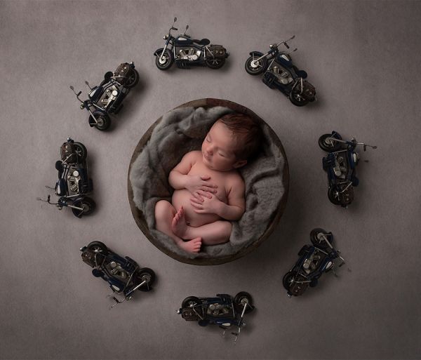 Newborn photoshoot using motorbike